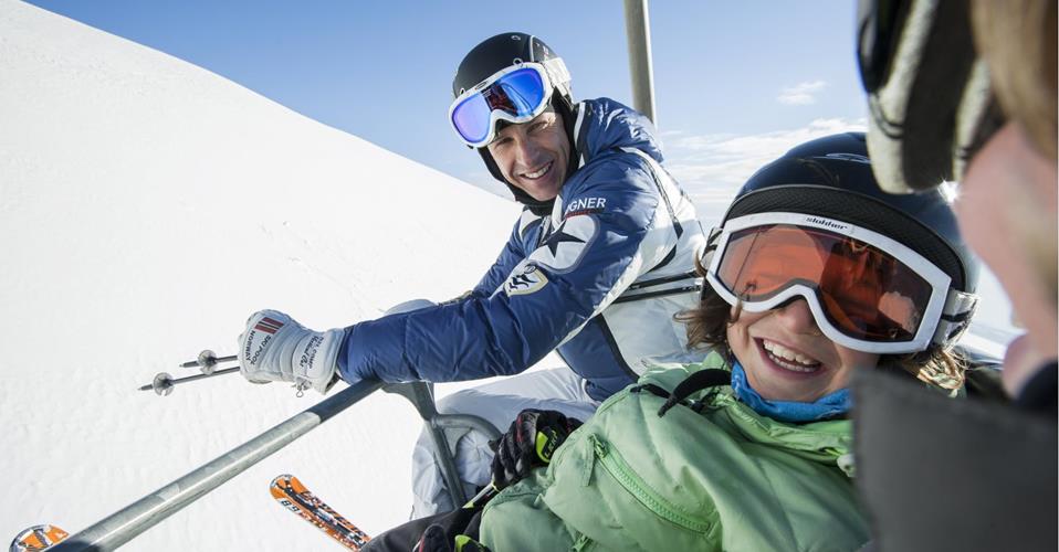 A family on a ski lift