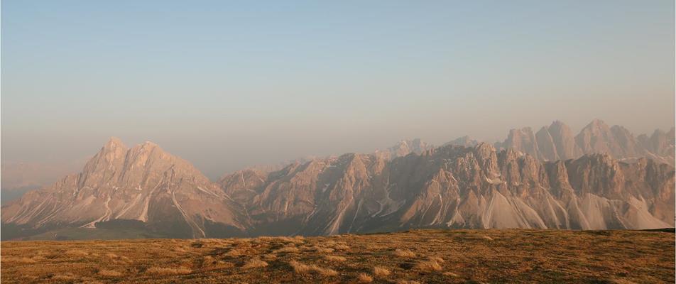 Expansive mountain landscape at sunset